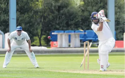  ?? PHOTO: LINDA ROBERTSON ?? Right through . . . Otago batsman Neil Broom is bowled by Auckland paceman Lockie Ferguson (not pictured) in the sides’ Plunket Shield clash at the University Oval yesterday. Auckland wicketkeep­er Matt McKeown looks on.