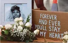  ??  ?? Flowers and tributes are placed on the Star for Aretha Franklin on the Hollywood Walk of Fame on Thursday.