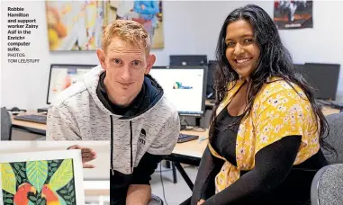  ?? PHOTOS: TOM LEE/STUFF ?? Robbie Hamilton and support worker Zainy Asif in the Enrich+ computer suite.