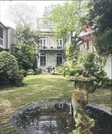  ?? Sharon Danovich Lupone photos ?? A pool and statue are focal points in Mrs. Whaley's garden in Charleston, S.C. It was designed by Loutrel Briggs in collaborat­ion with Emily Whaley.