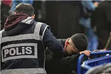  ?? ?? Relatives of missing miners react while waiting Saturday in front of the mine in Amasra, Turkey.