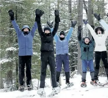  ?? ONTARIO PARKS ?? Exuberant winter lovers have a ball at Frontenac Provincial Park.