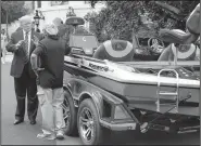  ?? AP/EVAN VUCCI ?? President Donald Trump talks with Jimmy Houston of Flippin-based Ranger Boats as he participat­es Monday in a tour during a Made in America Product Showcase at the White House.