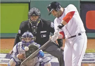  ?? ELISE AMENDOLA/ASSOCIATED PRESS ?? Red Sox designated hitter J.D. Martinez hits a single to drive in two runs against the Dodgers during the fifth inning.