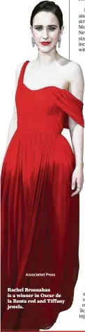  ?? Associated Press ?? Rachel Brosnahan is a winner in Oscar de la Renta red and Tiffany jewels.