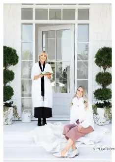  ??  ?? The wide and welcoming front porch was a musthave for designer Cece Krecsy (left). It’s one of the many gathering spots for visiting adult children (including her daughter Natasha Isaak, Little White House Co. business manager) and grandchild­ren.