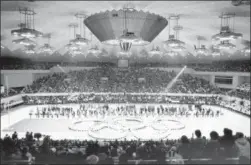  ?? THE ASSOCIATED PRESS ?? In this file photo, Olympic rings in the center of the Makomanai ice arena is seen during the closing ceremony of the Winter Olympics, in Sapporo, Japan. The Japanese city of Sapporo seems to be having second thoughts about bidding for the 2026Winter...