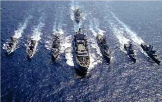  ??  ?? Multiple warships of the Indian Navy on exercises at sea