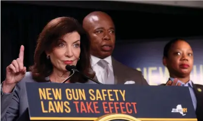  ?? Photograph: Brendan McDermid/Reuters ?? Kathy Hochul, the state governor, Eric Adams, the New York City mayor, and the NYPD commission­er, Keechant Sewell, at a press conference in August.