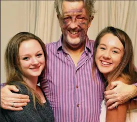  ??  ?? Horrific injuries: Paul Kohler with daughters Tamara and Saskia