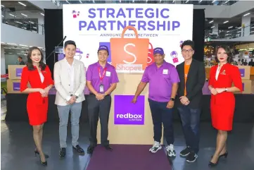  ??  ?? (From second left) Ho, Mohd Shukrie, AirAsia Group chief executive officer Tan Sri Tony Fernandes and Shopee head of operations Esten Mok at the announceme­nt of partnershi­p between RedBox and Shopee.