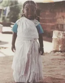  ??  ?? Yasmin Mumed as a child in Ethiopia.