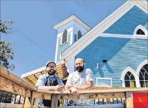  ?? TERRENCE MCEACHERN/THE GUARDIAN ?? Jeff Grandy, left, and his brother Peter, both from Charlottet­own, have converted a former church in Alma, N.B., to house a taproom, coffee roast and craft brewery, with plans to open in September.