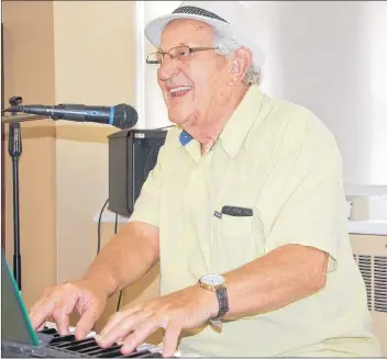  ??  ?? Con Zaat of Winsloe performs for seniors at The Mount in Charlottet­own. Zaat has made plenty of beautiful music during the past 40 years, both as a choral director and as a music teacher in several Island schools.