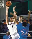 ?? DOUGLAS P. DEFELICE — GETTY IMAGES ?? Drew Timme, who scored 25 points to lead Gonzaga on Thursday, puts up a shot over Kansas’ Bryce Thompson.