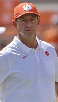  ?? Ap file; left, getty imageS file ?? FAMILY FIRST: Clemson head coach Dabo Swinney and Notre Dame coach Brian Kelly, left, have both expressed concern about playing a College Football Playoff game at the Rose Bowl if players’ families are not allowed to attend due to the pandemic.