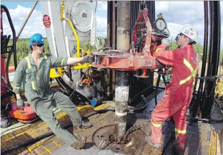  ?? STUART DAVIS ?? Rig employees work on the drilling floor of a Precision Drilling rig contracted by Encana Corp in northern B.C. With the rebound in oil prices, Precision has been able to hike rates for its deeper-reaching rigs called “super triples.”