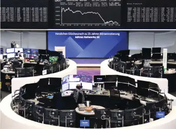  ?? ?? ▲The German share price index DAX graph is pictured at the stock exchange in Frankfurt, Germany.