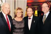  ??  ?? From left, Claude and Deborah Sauvé with Gerry Arial and Peter Frayne at the Chateau Laurier’s holiday party.