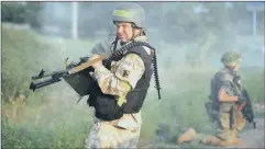  ?? PICTURE: MAKS LEVIN / REUTERS ?? DEFENDERS: Members of a Ukrainian battalion near Pervomaysk.