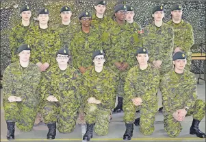  ?? JEREMY FRASER/CAPE BRETON POST ?? These 14 basic military qualificat­ion candidates graduated from local reserve force units at a parade held on Saturday at Victoria Park Armories in Sydney.