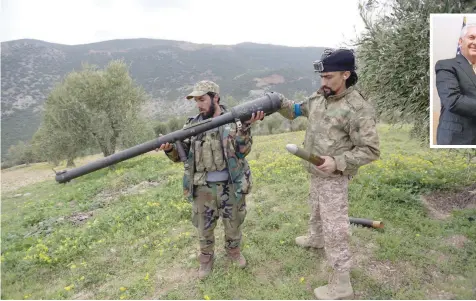  ?? — Reuters ?? Turkish-backed Free Syrian Army fighters are seen in Northern Afrin countrysid­e, Syria, on Friday.