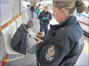  ?? JON MURRAY/PNG FILES ?? Under a new policy, only a Vancouver Transit Police watch commander can authorize calls to the Canadian Border Services Agency, and only in certain circumstan­ces.