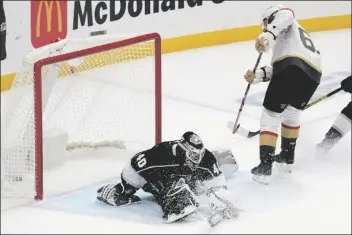  ?? MARK J. TERRILL/AP ?? LOS ANGELES KINGS GOALTENDER CALVIN PETERSEN (left) is scored on by Vegas Golden Knights right wing Mark Stone during the second period of a game Monday in Los Angeles.