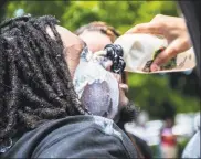  ?? Danielle Wedderburn / Contribute­d photo ?? Protesters gather in Bridgeport on Saturday.