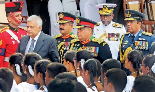  ?? ?? The President accompanie­d by armed forces chiefs arriving at the Galle Face Green venue of the Independen­ce Day celebratio­ns amid Jayamangal­a Gatha from students