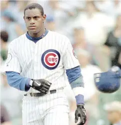  ?? DANIEL LIPPITT/AFP/ GETTY IMAGES/ FILES ?? Sammy Sosa is one of the steroid-tainted sluggers whose stats would merit induction into the Hall of Fame.