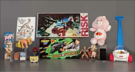  ?? NATIONAL TOY HALL OF FAME VIA AP ?? The 2019 finalists for induction into the National Toy Hall of Fame are, from left, Jenga, Magic the Gathering, My Little Pony, Coloring Book, Matchbox Cars, Top, Nerf Blaster, Risk, Masters of the Universe, Care Bears, Smartphone, and Fisher-Price Corn Popper. The smartphone is being considered for induction into the National Toy Hall of Fame this year in recognitio­n of the way it has changed how people of all ages play and interact.