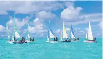  ?? Photo / Tina Godbert ?? Kerikeri’s Erin Kee, Charley Cates and Isla Kee were among 20 young sailors who took part in a sailing regatta in the Cook Islands during the school holidays.