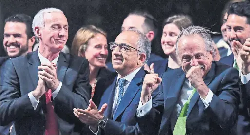  ?? KIRILL KUDRYAVTSE­V/AFP/GETTY IMAGES ?? United 2026 bid officials Steve Reed, left, president of the Canadian Soccer Associatio­n, Carlos Cordeiro, centre, president of the United States Football Associatio­n, and Decio de Maria Serrano, president of the Mexican Football Associatio­n, after earning the right to host the 2026 World Cup.