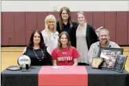  ?? Bud Sullins/Special to Siloam Sunday ?? Siloam Springs senior Chloe Price signed a letter of intent Wednesday to play volleyball at Coffeyvill­e (Kan.) Community College. Pictured are: Front from left, mother Brandi Price, Chloe Price, father Larry Price; back, former Siloam Springs volleyball coach and Chloe Price’s aunt, Rose Cheek-Willis; SSHS head coach Joellen Wright and assistant coach Kailey Greenleaf.