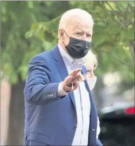  ?? MANUEL BALCE CENETA — THE ASSOCIATED PRESS ?? President Joe Biden and first lady Jill Biden leave after attending a service at Holy Trinity Catholic Church in the Georgetown section of Washington on Saturday.