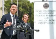  ?? KENT NISHIMURA / AGENCE FRANCE-PRESSE ?? Hawaii State Attorney General Douglas Chin speaks as Oregon Attorney General Ellen Rosenblum looks on at a press conference in Hawaii on Wednesday,