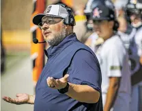  ??  ?? Demons coach Andrew Martinez reacts after a missed catch.