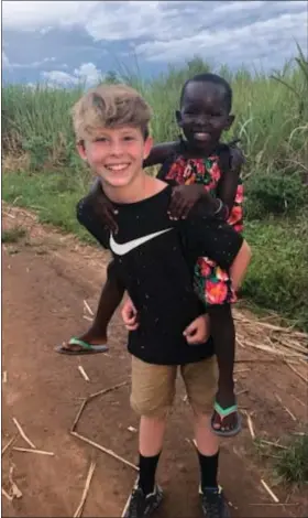  ?? PHOTO COURTESY OF BRIAN CARLUCCI ?? Wyatt Carlucci on a service trip to Uganda in 2019