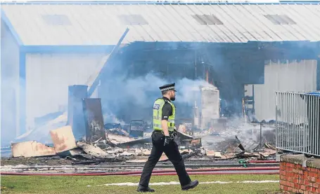  ?? Pictures: Steve MacDougall. ?? The site at Perth Airport, Scone, is now a crime scene.