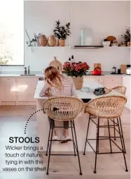  ?? ?? STOOLS Wicker brings a touch of nature, tying in with the vases on the shelf