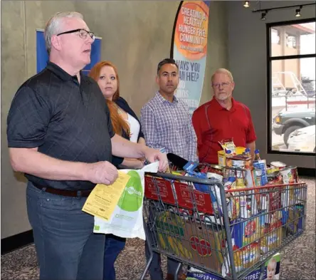  ?? Contribute­d ?? Gordon Oliver,left, public affairs director for the B.C. Thanksgivi­ng Food Drive; Lenetta Parry of the Central Okanagan Food Bank, Kelowna mayor Colin Basran and West Kelowna mayor Doug Findlater at a press conference discussing the seventh annual B.C....