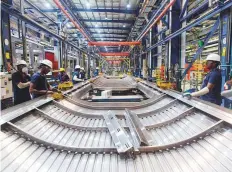  ?? Bloomberg ?? Workers at the Alstom SA manufactur­ing facility in Sri City, Andhra Pradesh. India’s gross domestic product is heading for its first full-year contractio­n in 40 years.