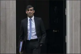  ?? ALBERTO PEZZALI — THE ASSOCIATED PRESS ?? Britain’s Prime Minster Rishi Sunak leaves 10Downing St. to go to the House of Commons on Wednesday. Sunak recently denounced “a shocking increase in extremist disruption and criminalit­y” in a televised address.