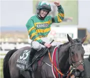  ?? AFP ?? Jockey Rachael Blackmore on Minella Times celebrates winning the Grand National.