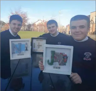  ??  ?? Well done to Lorcan Mallon, Sam Cunningham and Kian Mackle (pictured) from St Mary’s for their TY mini company.
Name Frames are customised frames for families or for special occasions such as birthdays, Christmas, newborn and much more, selling for €20.
“I had seen them online and looked at where you could find them and realised that no one local makes them so we decided to start producing them, our year head is Ms. Curtis and she has really helped us set it up,” said Sam.
“You can find us on Humans of St. Mary’s, text our facebook page Name Frame or email me at SCunningha­m16@stmarysds.ie.”
Drogheda Grammar School student Matthew Maloney was presented with the Tommy Murray Award for most aspiring young writer at the recent Francis Ledwidge Poetry Awards, where he is pictured with Poet in Residence Catherine Anne Cullen. His short story was called ‘Singing Man of Dingle’ and the awards were held by the Inchicore Ledwidge Society in Dublin.