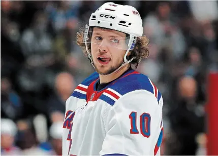  ?? DAVID ZALUBOWSKI THE ASSOCIATED PRESS FILE PHOTO ?? New York Rangers star Artemi Panarin is taking a leave of absence after a Russian tabloid printed allegation­s from a former coach that he attacked an 18-year-old woman in Latvia in 2011.