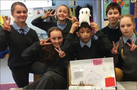  ??  ?? Pupils from Glebe NS in Wicklow town display their ‘Baggit’ project to charge tech devices on the go.