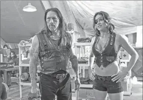  ??  ?? Danny Trejo and Michelle Rodriguez in a screenshot from Machete Kills. (Photo: collider)