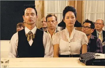  ?? In the Family ?? RAY (George Young), left, Karl (Trevor St. John), May (Janet Hsieh), Alan (Andy Pang) in “Bread Factory.”